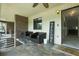 Covered front entrance with seating and stairs at 563 Belltower Ave # 240, Deltona, FL 32725