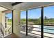 Lanai with pool view and outdoor access, perfect for relaxation at 563 Belltower Ave # 240, Deltona, FL 32725