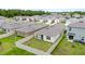 A well-maintained lawn is completely enclosed by a white vinyl fence at 7112 Mottled Duck Dr, Harmony, FL 34773
