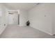 This is a bright and airy living room with tile floors and neutral paint at 7112 Mottled Duck Dr, Harmony, FL 34773