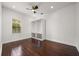 This spacious bedroom features gleaming hardwood floors, lots of light and ample closet space at 7733 Pointe Venezia Dr, Orlando, FL 32836
