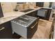 Kitchen sink area featuring modern faucet and granite countertops at 7733 Pointe Venezia Dr, Orlando, FL 32836