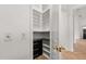 Well-organized pantry featuring black drawers, granite counters and white shelving for ample storage at 7733 Pointe Venezia Dr, Orlando, FL 32836