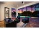 Inviting covered patio with comfortable seating overlooks the pool at 7733 Pointe Venezia Dr, Orlando, FL 32836
