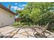 Serene backyard with flagstone patio, relaxing seating, and a koi pond at 800 Hamilton Place Ct, Winter Park, FL 32789