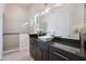 Bathroom with granite countertops, a modern sink, and a glass-enclosed shower at 800 Hamilton Place Ct, Winter Park, FL 32789
