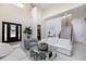 Spacious living room with high ceilings, modern furnishings, and abundant natural light at 800 Hamilton Place Ct, Winter Park, FL 32789