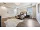 Stylish main bedroom with hardwood floors, recessed lighting and modern design at 800 Hamilton Place Ct, Winter Park, FL 32789
