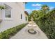 Charming yard featuring a tiered fountain and meticulously maintained greenery at 800 Hamilton Place Ct, Winter Park, FL 32789