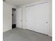 Bedroom featuring carpet flooring, white trim and sliding closet doors at 8113 Key West Dove St, Winter Garden, FL 34787