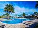 Inviting community pool with a fountain feature and ample seating, perfect for relaxation at 8113 Key West Dove St, Winter Garden, FL 34787