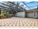 Expansive screened-in lanai, featuring a spa and tiled flooring for outdoor enjoyment at 8113 Key West Dove St, Winter Garden, FL 34787