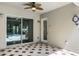 Covered patio boasting decorative tile flooring and a ceiling fan for added comfort at 8113 Key West Dove St, Winter Garden, FL 34787