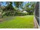 A beautifully maintained lawn bordered by a manicured hedge adds a serene backdrop to the property at 871 Paddington Ter, Lake Mary, FL 32746
