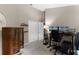 Bedroom features a desk with dual monitors and double door closet at 871 Paddington Ter, Lake Mary, FL 32746