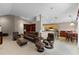 Spacious living room featuring neutral tones, an open floor plan, and ample seating at 871 Paddington Ter, Lake Mary, FL 32746