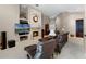 An inviting living room with fireplace, built-ins, and a comfortable seating area at 871 Paddington Ter, Lake Mary, FL 32746
