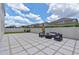 Beautiful backyard with paved patio and stylish outdoor furniture, perfect for relaxing and entertaining at 9025 Horizon Pointe Trl, Windermere, FL 34786