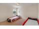 Bright bedroom featuring two race car beds and natural light from the windows at 9025 Horizon Pointe Trl, Windermere, FL 34786