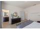 Comfortable bedroom with an ensuite bathroom and closet at 9025 Horizon Pointe Trl, Windermere, FL 34786