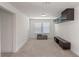 Spacious bonus room with carpeted floors, a large window, and modern finishes at 9025 Horizon Pointe Trl, Windermere, FL 34786