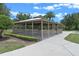 Community gazebo in lush green space, offering outdoor seating and recreation at 9025 Horizon Pointe Trl, Windermere, FL 34786