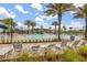 Beautiful community pool and recreation area with lounge chairs and a waterslide, perfect for outdoor fun and relaxation at 9115 Longship Aly, Orlando, FL 32832