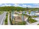 Community playground surrounded by mature trees and landscaping at 9115 Longship Aly, Orlando, FL 32832