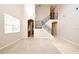 Bright living room featuring staircase and neutral colors at 9223 Leeland Archer Blvd, Orlando, FL 32836