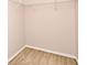 Carpeted walk-in closet space with wire shelving for optimal storage and organization at 9223 Leeland Archer Blvd, Orlando, FL 32836