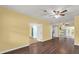 Inviting living room with hardwood floors and a ceiling fan at 1008 Bay Ave, Lake Wales, FL 33859