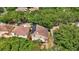 A close aerial view shows a home with solar panels and a driveway in a residential neighborhood at 1039 Eagles Forrest Dr, Apopka, FL 32712