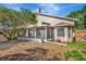Backyard view with a screened patio attached to the home at 1039 Eagles Forrest Dr, Apopka, FL 32712
