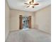 Bedroom with neutral carpet and slider leading to backyard at 1039 Eagles Forrest Dr, Apopka, FL 32712
