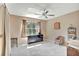 Cozy bedroom featuring neutral walls, carpet flooring, ceiling fan, and natural light at 1039 Eagles Forrest Dr, Apopka, FL 32712