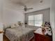 Bedroom featuring a window and simple furnishings creating a cozy and functional area at 1128 Travertine Ter, Sanford, FL 32771