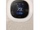 Ecobee thermostat showing the temperature is set at 73 degrees at 13010 Plum Lake Cir, Minneola, FL 34715