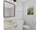 Bright bathroom with vanity, mirror, and window offering natural light at 1309 W Yale St, Orlando, FL 32804