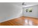 Bedroom features hardwood floors, a ceiling fan, and lots of open space at 1309 W Yale St, Orlando, FL 32804