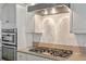 Modern kitchen featuring stainless steel appliances and a range hood at 1309 W Yale St, Orlando, FL 32804