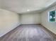 Bright bedroom with carpet, a window providing natural light, and electrical outlets at 13108 Long Pine Trl, Clermont, FL 34711