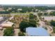 Panoramic aerial shot featuring lush landscapes, cityscapes and a quirky miniature golf course at 13427 Blue Heron Dr # 2-1401, Orlando, FL 32821