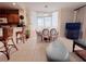 Spacious living room with dining area and large windows offering panoramic views at 13427 Blue Heron Dr # 2-1401, Orlando, FL 32821