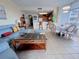 Bright and inviting living area featuring tile floors, stylish furniture, and an open floor plan at 13427 Blue Heron Dr # 2-1401, Orlando, FL 32821