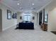 Well-lit lobby featuring tile floors, comfortable seating, and elegant decor at 13427 Blue Heron Dr # 2-1401, Orlando, FL 32821