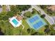 Aerial view showcasing community pool and tennis courts at 145 Lakeside Cir, Sanford, FL 32773