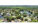 Aerial view of neighborhood with a lake at 145 Lakeside Cir, Sanford, FL 32773