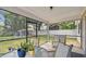 Screened patio with a view of the backyard at 145 Lakeside Cir, Sanford, FL 32773