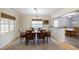 Cozy dining room with wood floors, dining table set, and a view of the breakfast nook at 1639 Choctaw Trl, Maitland, FL 32751