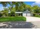 Charming single-story home featuring a two-car garage, well-manicured lawn, and a basketball hoop in the driveway at 1639 Choctaw Trl, Maitland, FL 32751
